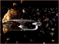 L'Enterprise sortant du champ de débrits